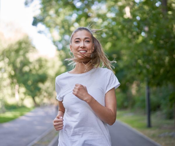 sportive-woman-warming-up-in-summer-park-sport-hea-2024-12-13-08-57-00-utc